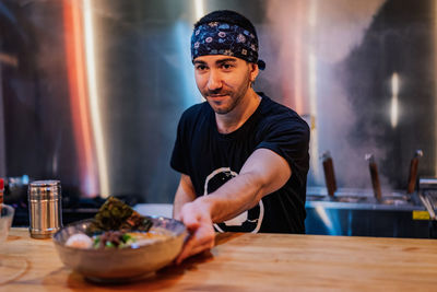 Young man preparing food