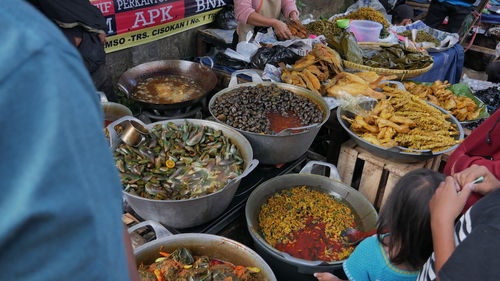 High angle view of traditional food for sale at market stall