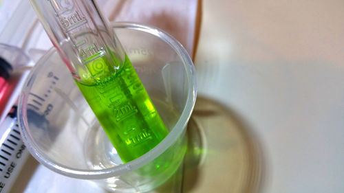 High angle view of drink in glass on table