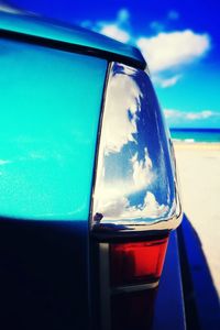 Close-up of blue sea against sky