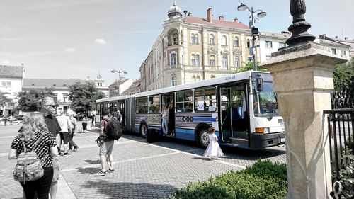 People walking on street in city