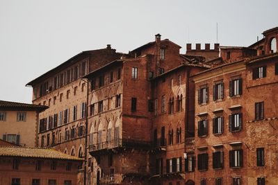 Low angle view of residential buildings against sky