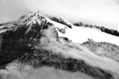 Snow covered mountain against sky