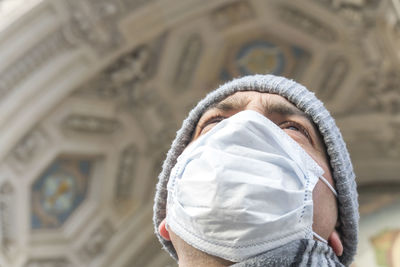 Portrait of man wearing mask outdoors