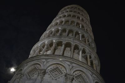 Low angle view of historical building against sky at night