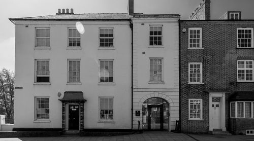 Exterior of building in town against sky