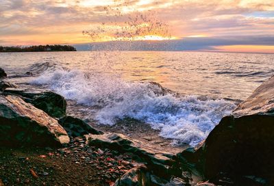 Scenic view of sea against sky during sunset