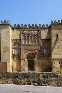 Exterior of historic building against clear sky