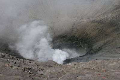 High angle view of smoke emitting from volcano