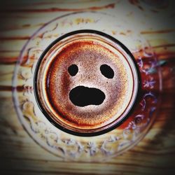 High angle view of coffee cup on table