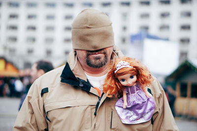 Midsection of couple in city during winter