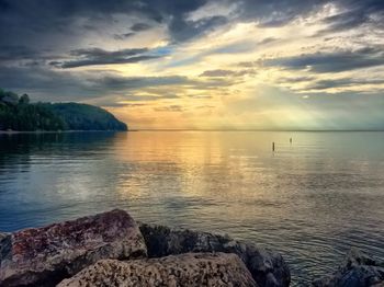 Scenic view of sea at sunset