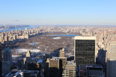 High angle view of city buildings against sky