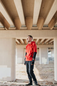 Young man in red hoodie. 