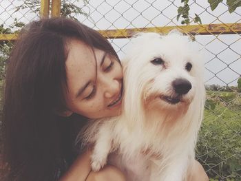 Portrait of woman with dog