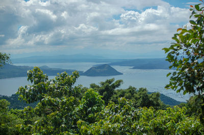 Scenic view of landscape and mountains against sky