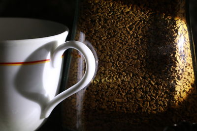 Close-up of coffee cup on table