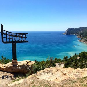 Scenic view of sea against clear blue sky