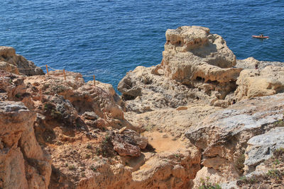 High angle view of rocks on beach