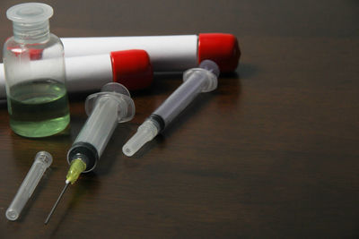 High angle view of bottles on table
