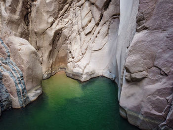 Scenic view of rock formation in water