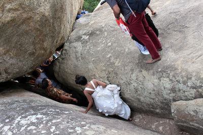 Low section of women on rock