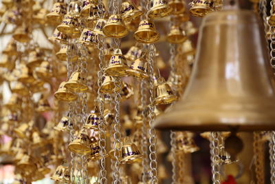 Close-up of glass decoration hanging in store