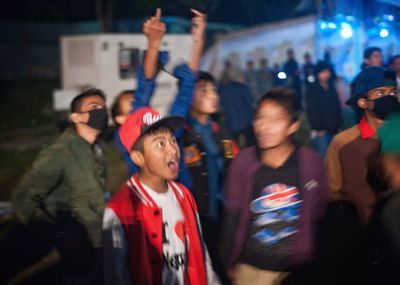 Group of people looking at music concert