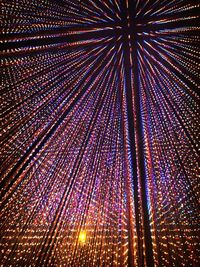 Low angle view of illuminated ferris wheel