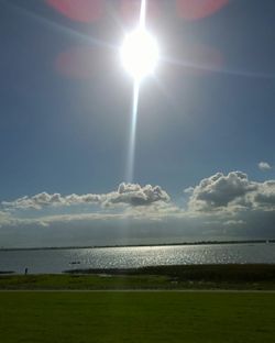 Scenic view of landscape against blue sky