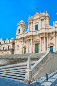 Low angle view of building against blue sky