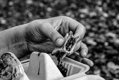 Close-up of man holding ice cream