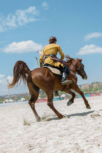 Man riding horse