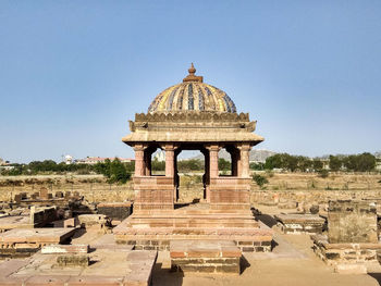 Old temple against clear blue sky