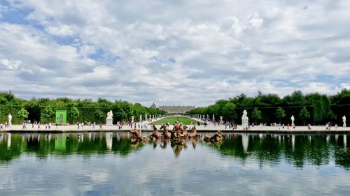 Scenic view of fountain against sky in versailles castle in france