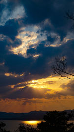 Scenic view of silhouette trees against sky during sunset