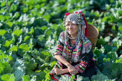 Full length of woman working in farm