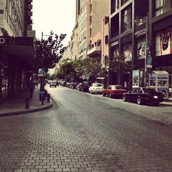 Cars on street in city