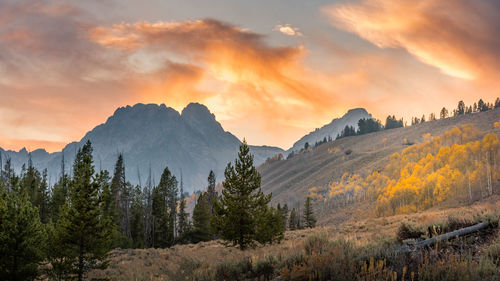 Scenic view of mountains against sky during sunset