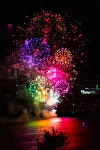 Firework display at night