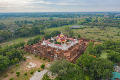 High angle view of trees and buildings against sky