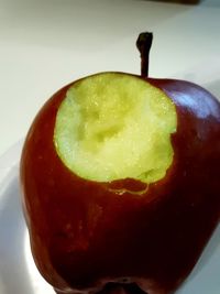 Close-up of apple against white background