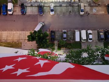 High angle view of trees by building in city