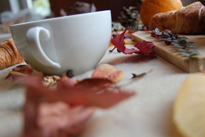 Close-up of coffee cup on table