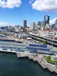 High angle view of cityscape taken from seattle great wheel against sky