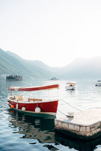 Boat in lake against clear sky