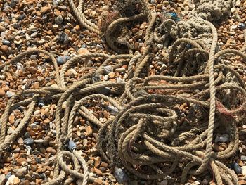 Full frame shot of fishing net on beach