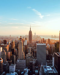 Modern buildings in city against sky