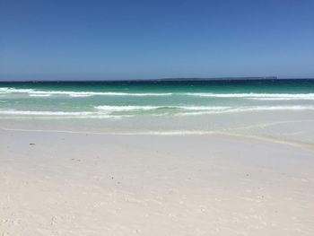 Scenic view of sea against clear sky