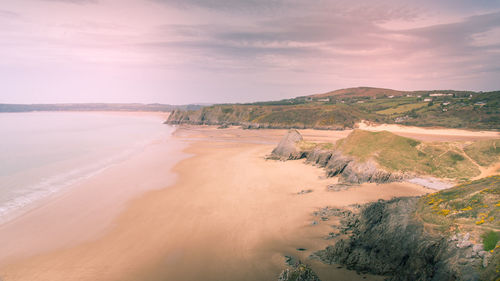 Scenic view of sandy beach bay on the gower peninsula